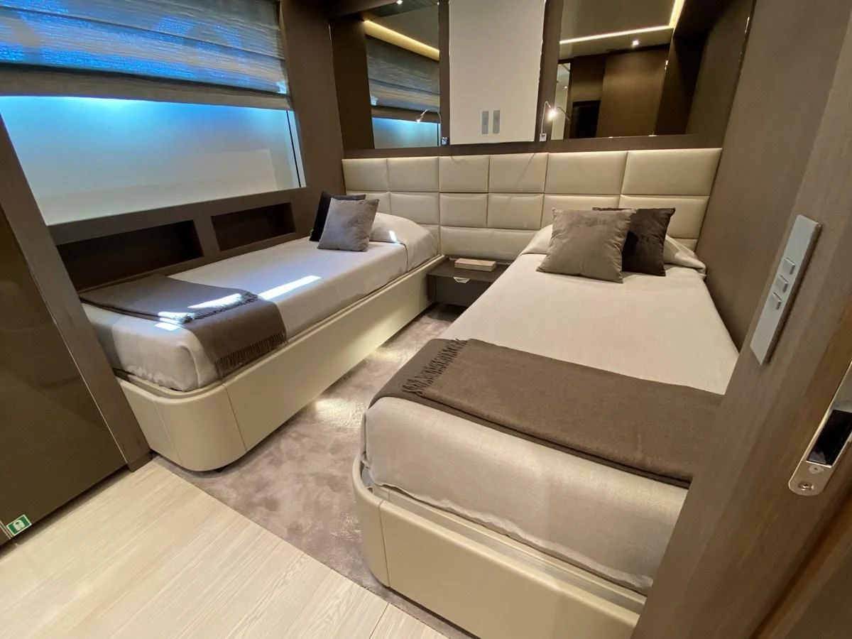 a room with a couple of beds aboard SELIN Yacht for Sale