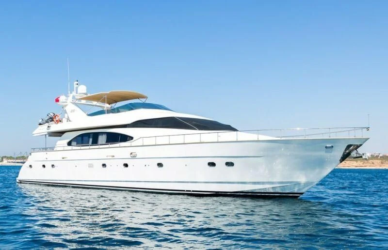 a white yacht on the water aboard NISAN Yacht for Sale