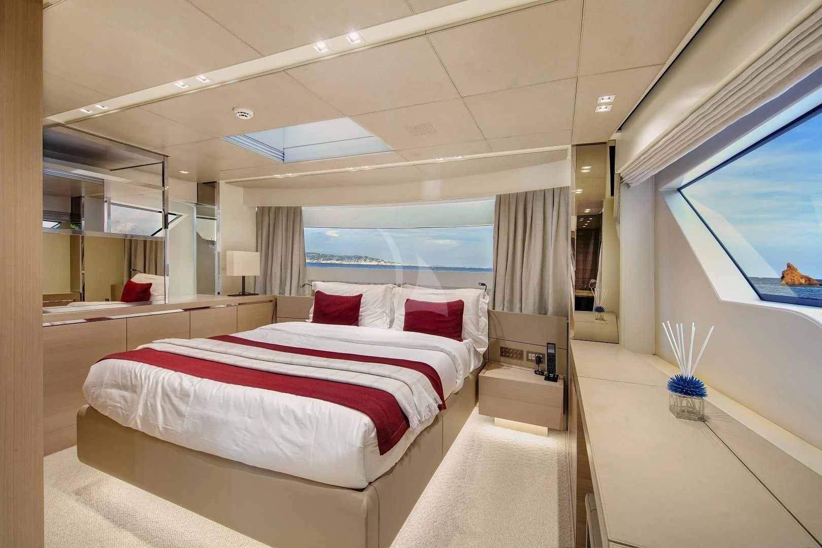a room with a bed and a tv aboard BELLE DE NUIT Yacht for Sale