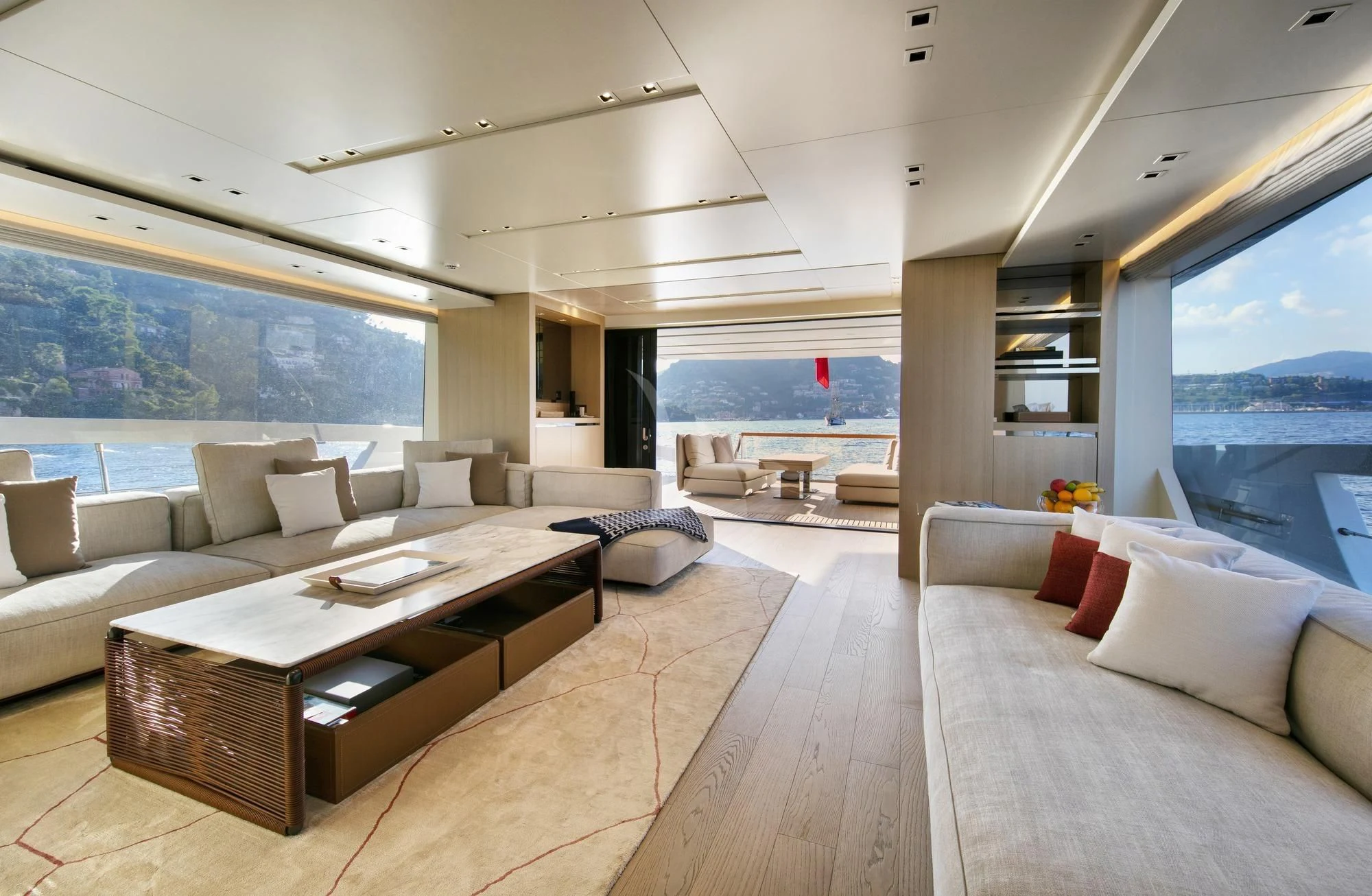 a living room with a large window aboard BELLE DE NUIT Yacht for Sale