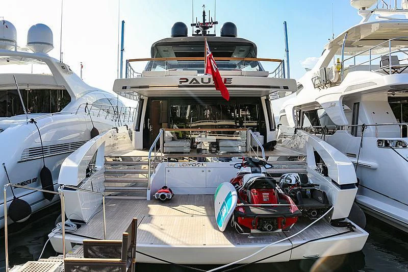 a boat with a car on it aboard BELLE DE NUIT Yacht for Sale
