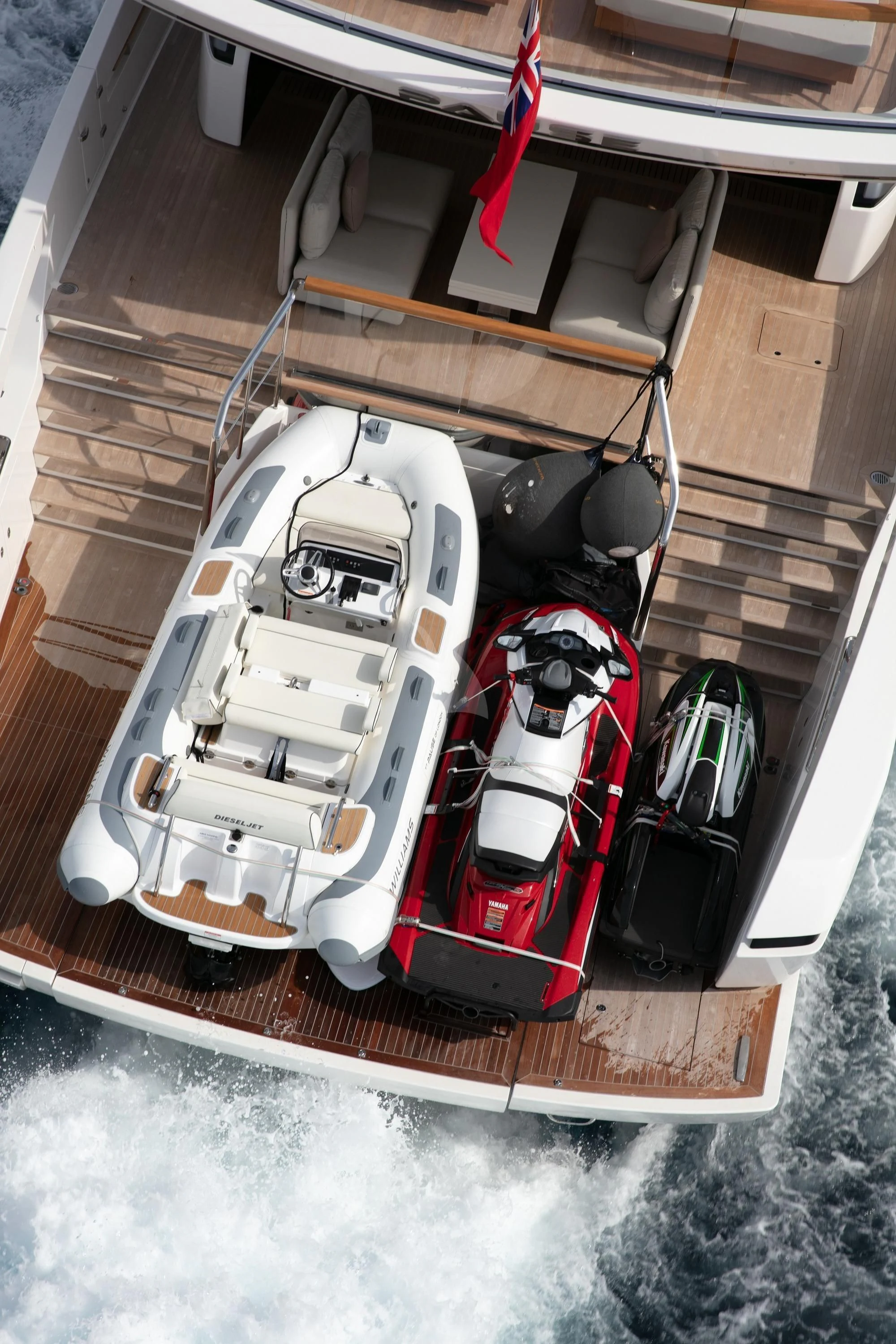 a toy car on a wood platform aboard BELLE DE NUIT Yacht for Sale