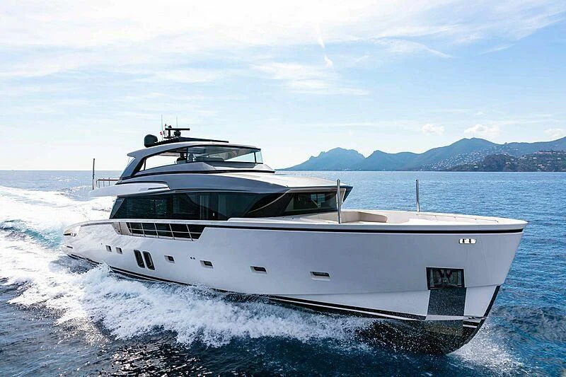 a white yacht on the water aboard BELLE DE NUIT Yacht for Sale