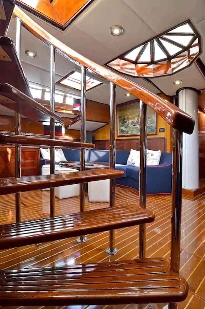 a room with wooden floors and a glass ceiling aboard WIND OF CHANGE Yacht for Charter
