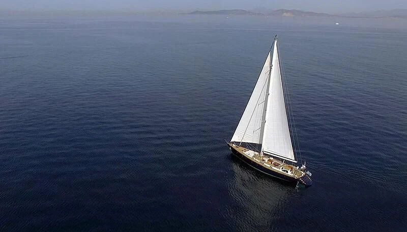a sailboat in the ocean aboard WIND OF CHANGE Yacht for Charter