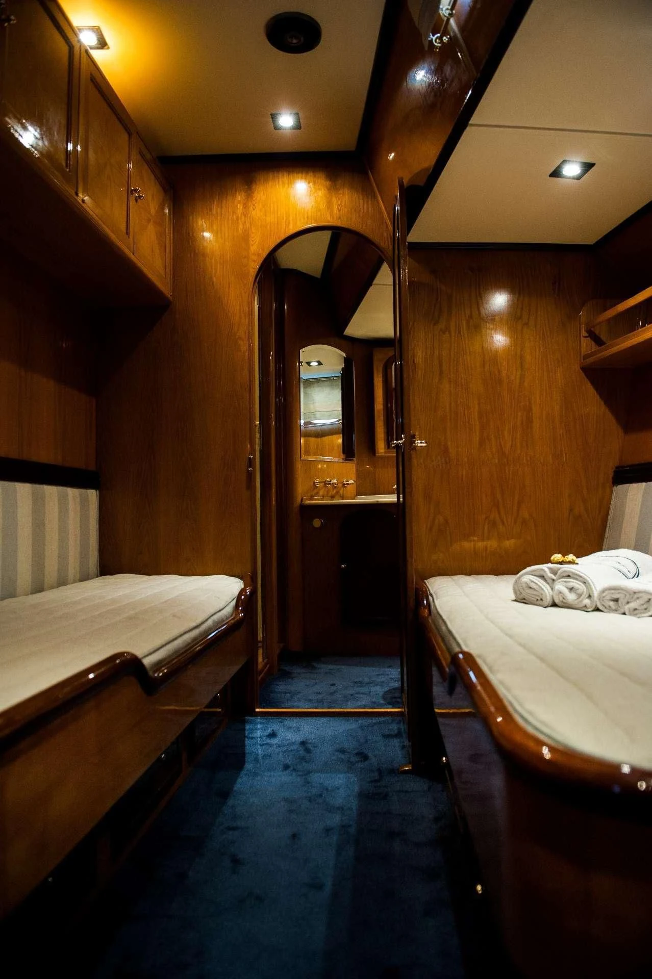 a room with a couple of beds aboard WIND OF CHANGE Yacht for Charter