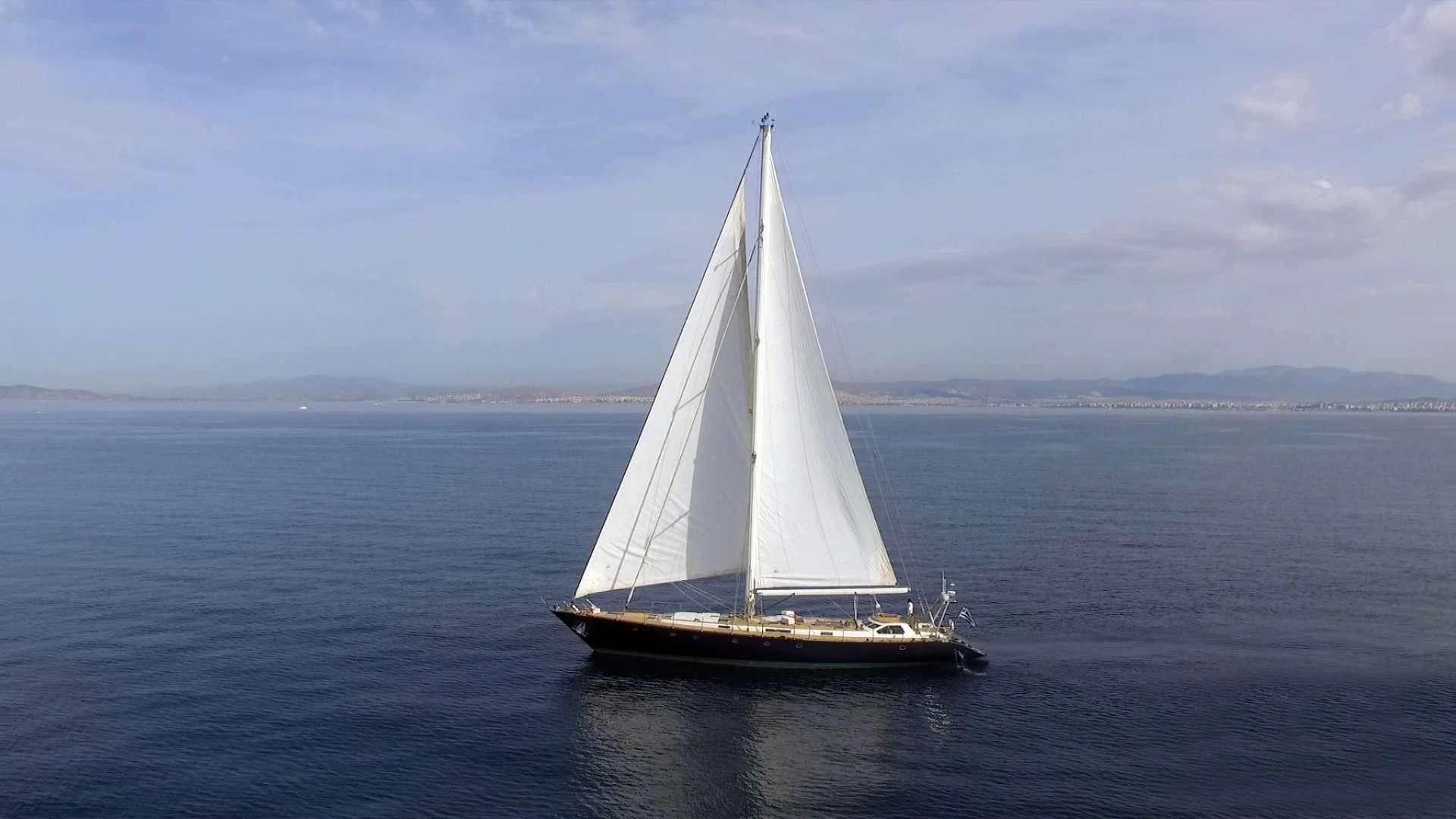 a sailboat in the water aboard WIND OF CHANGE Yacht for Charter