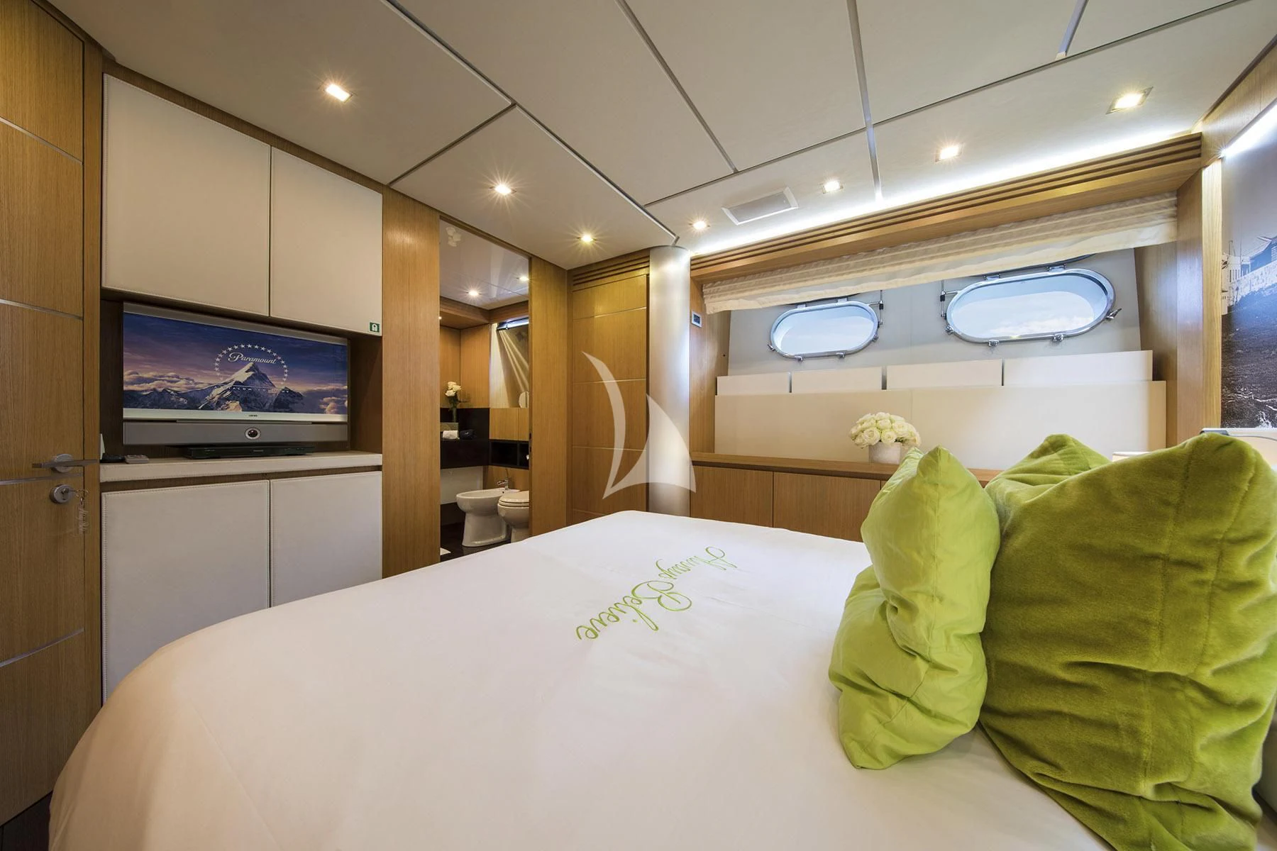 a bed in a room aboard ALWAYS BELIEVE Yacht for Sale
