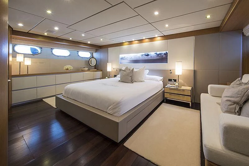 a large bedroom with a large bed aboard ALWAYS BELIEVE Yacht for Sale