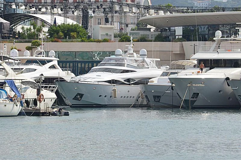several boats in a harbor aboard ALWAYS BELIEVE Yacht for Sale