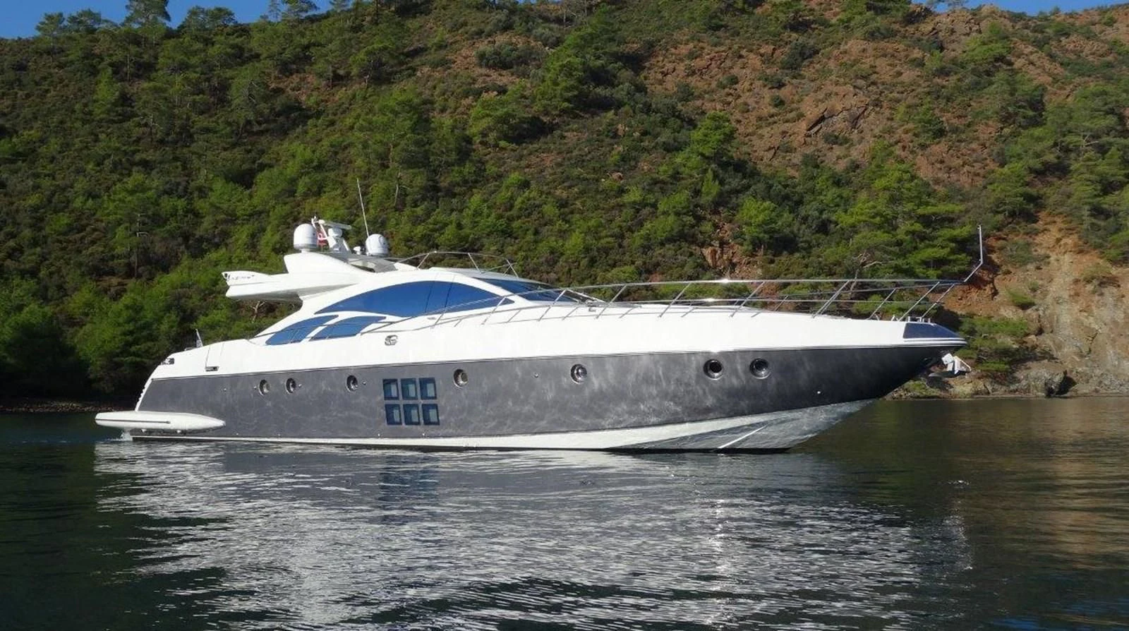 a white yacht in the water aboard PATRIOT Yacht for Sale