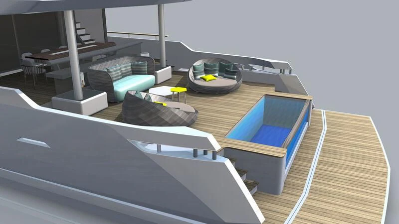 a table with a laptop and a fan on it aboard NUMARINE 40MXP #2 Yacht for Sale