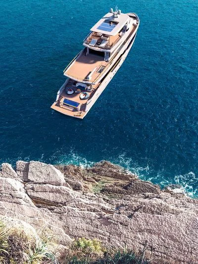 a boat on a rocky shore aboard NUMARINE 40MXP #2 Yacht for Sale