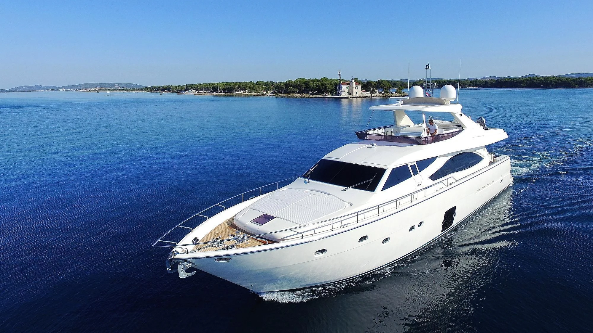 a white yacht on the water aboard ONYX Yacht for Charter