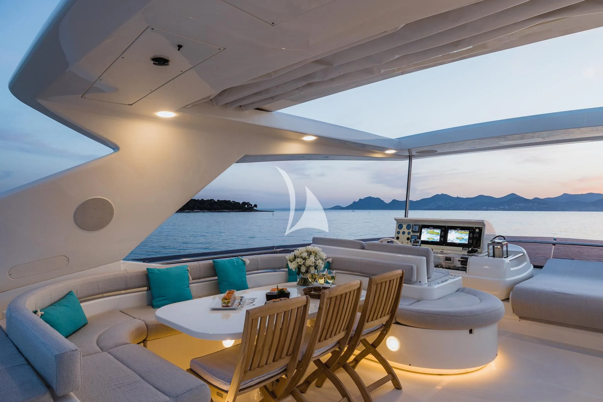 a room with a table and chairs aboard ONYX Yacht for Charter