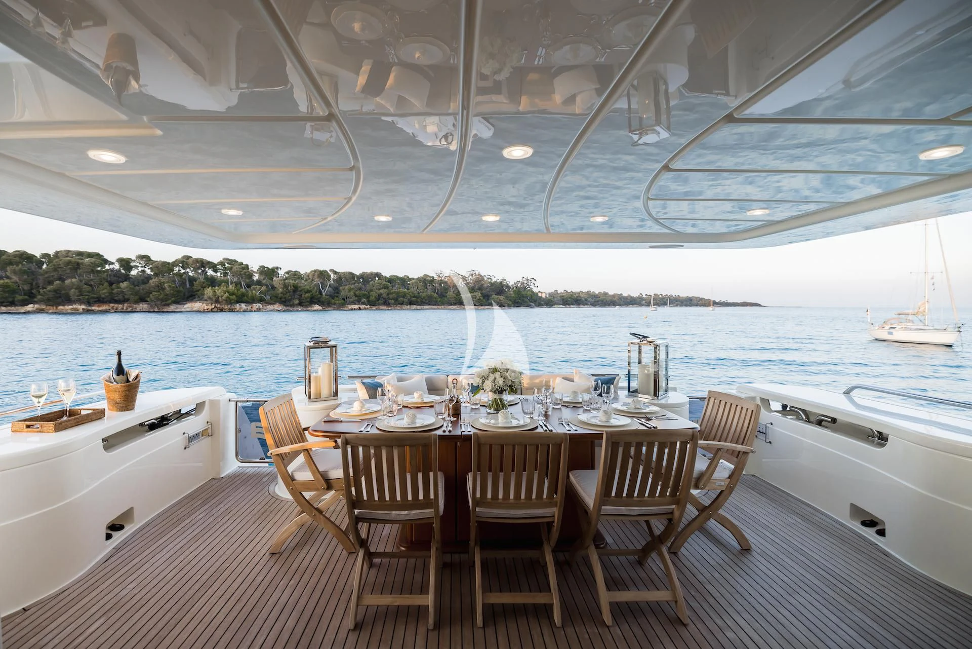 a table set for a meal on a boat aboard ONYX Yacht for Charter