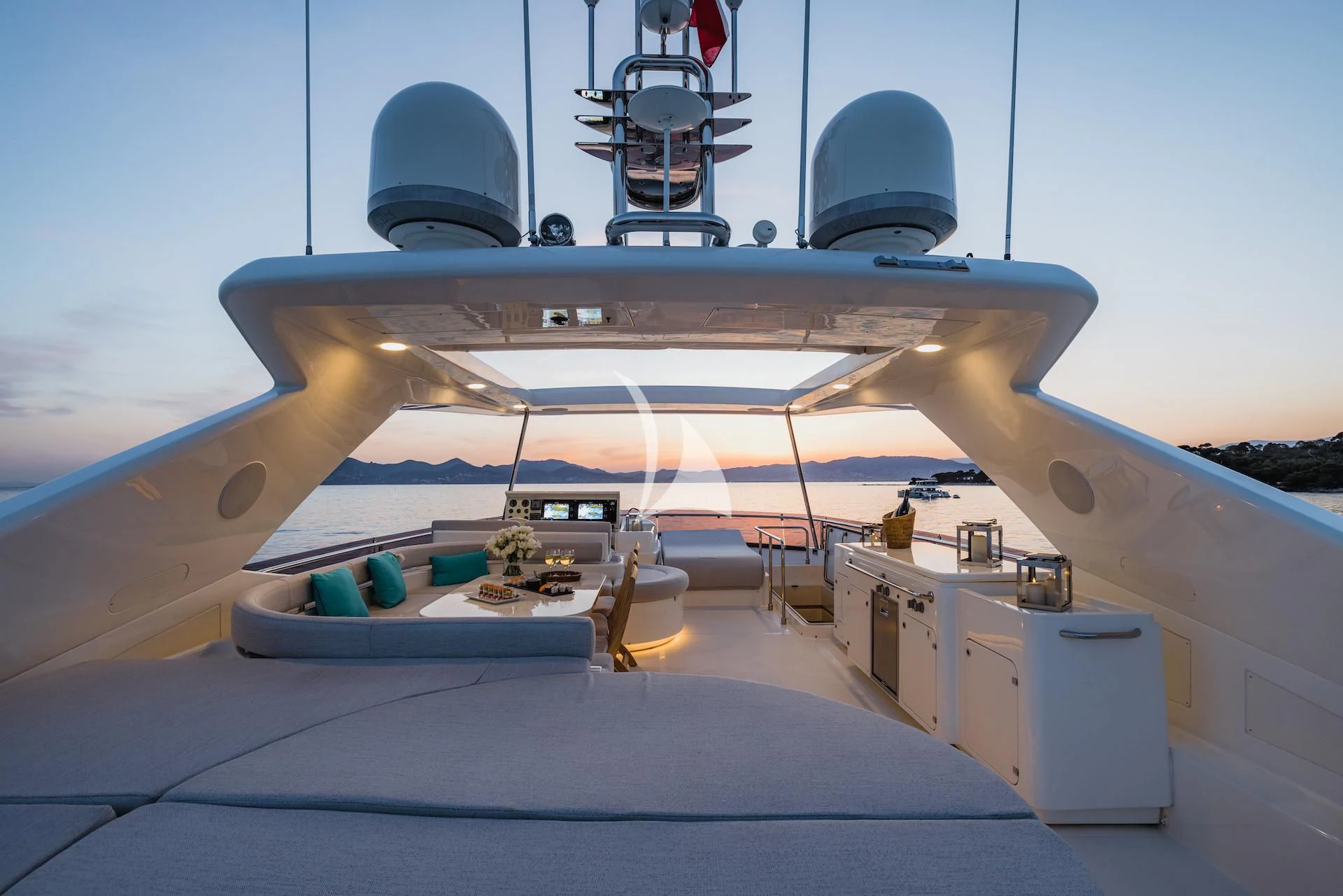a large white airplane with a large propeller on it aboard ONYX Yacht for Charter