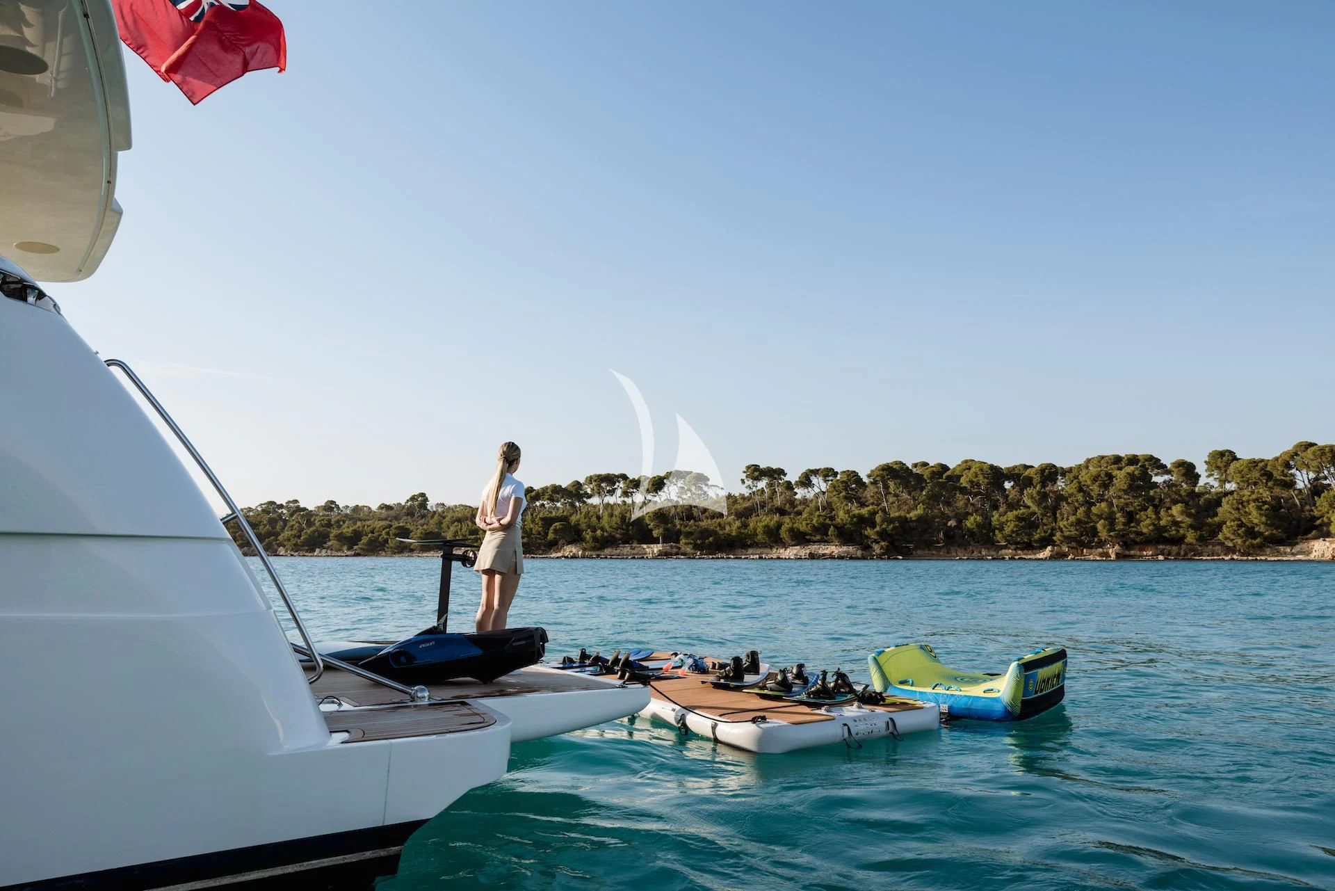 a person standing on a boat aboard ONYX Yacht for Charter