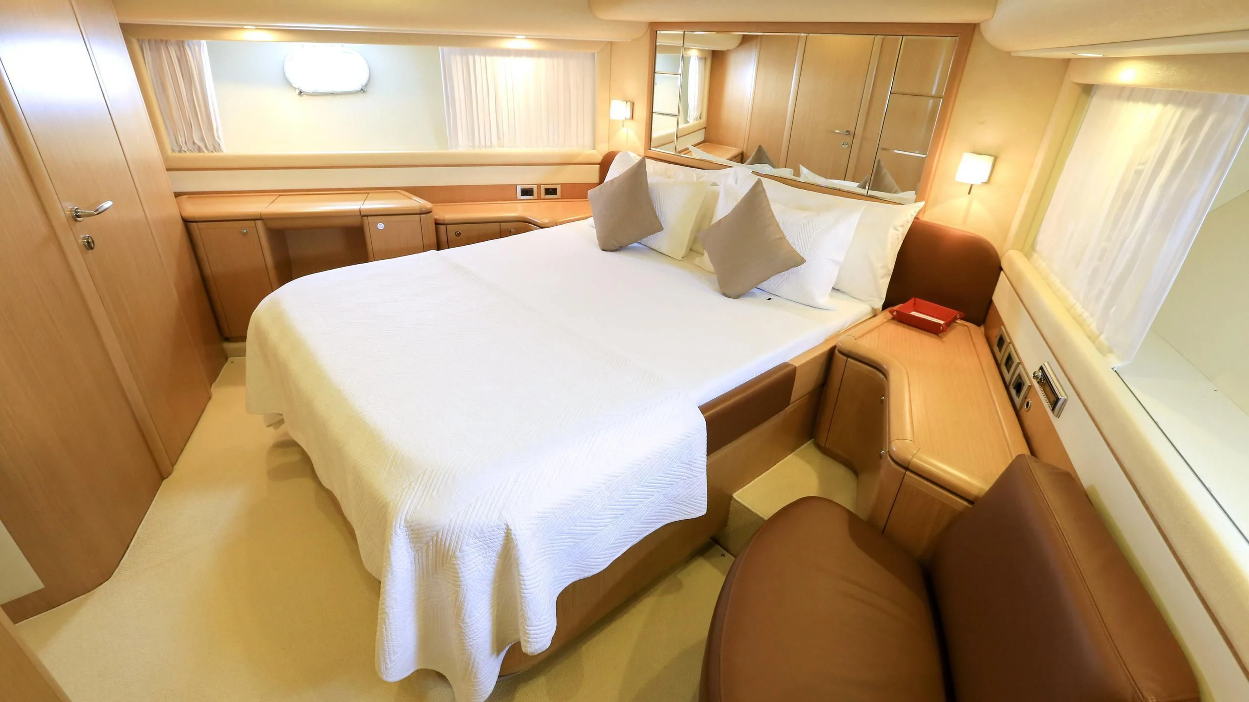 a hotel room with a bed aboard ONYX Yacht for Charter
