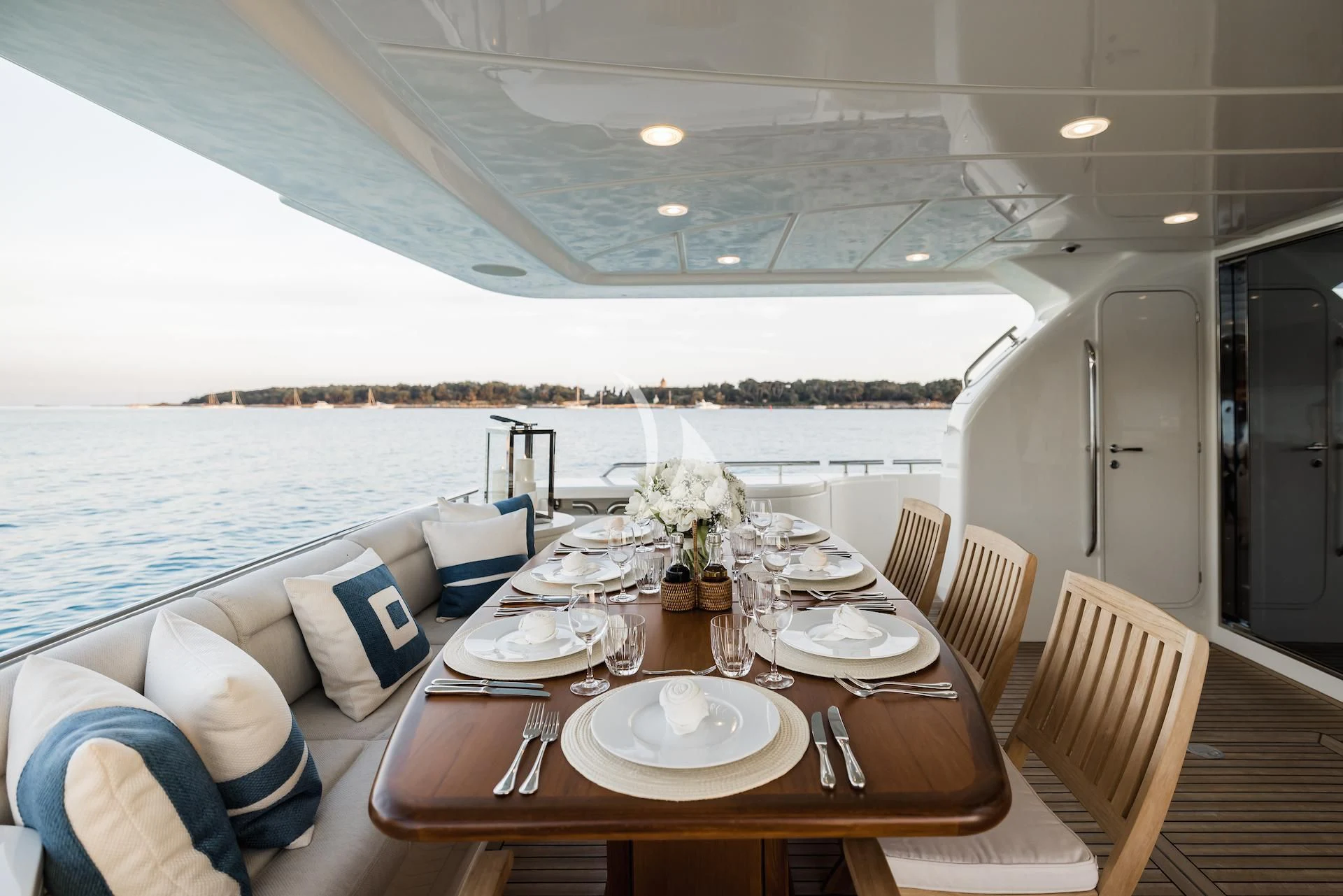 a dining table set for a meal aboard ONYX Yacht for Charter