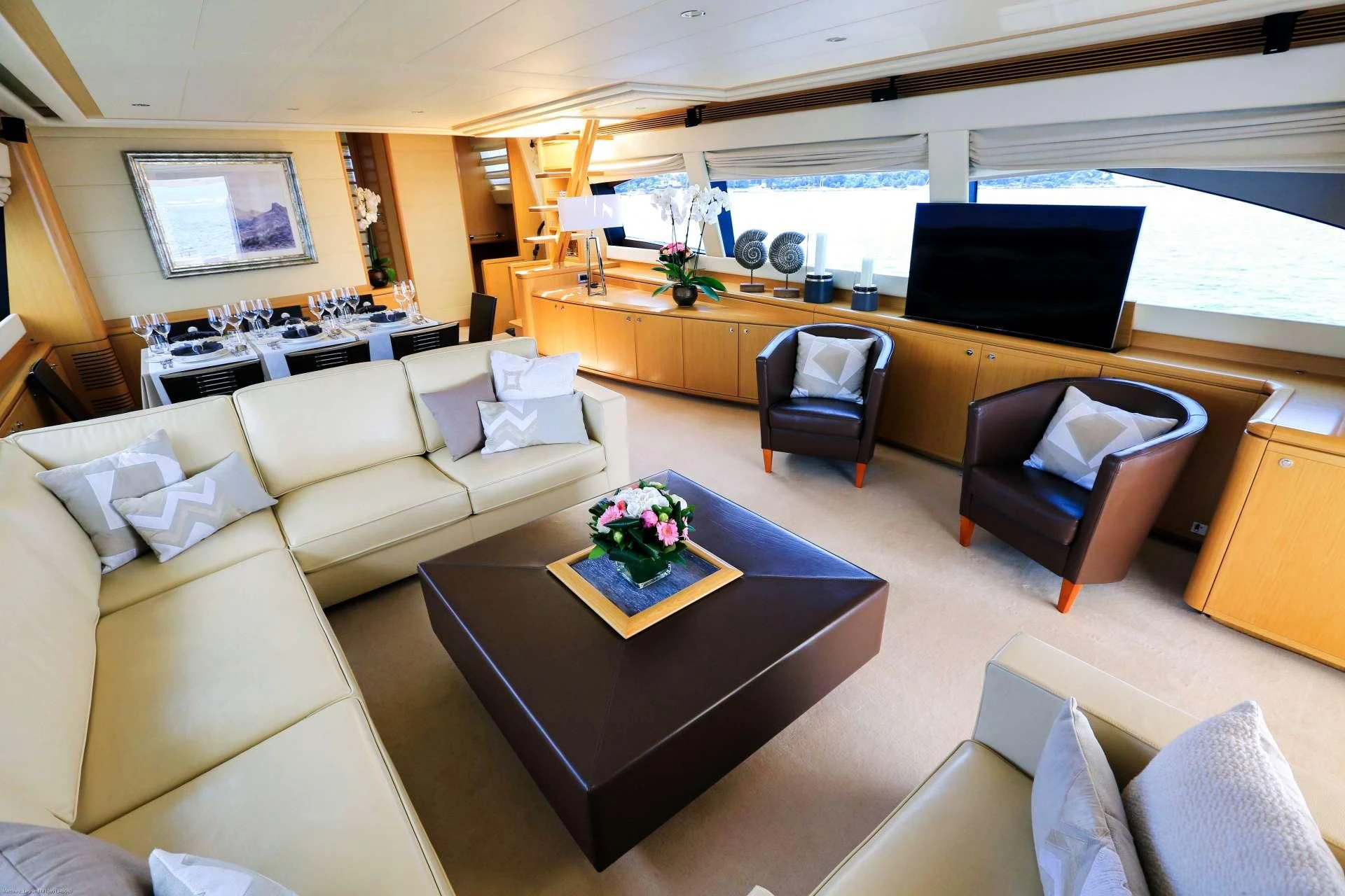 a living room with a large window aboard ONYX Yacht for Charter