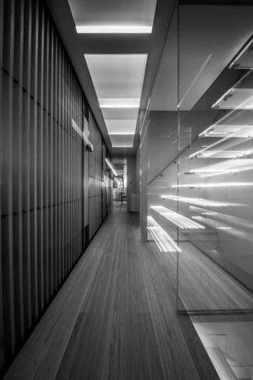 a hallway with a row of metal doors aboard MARLA Yacht for Sale