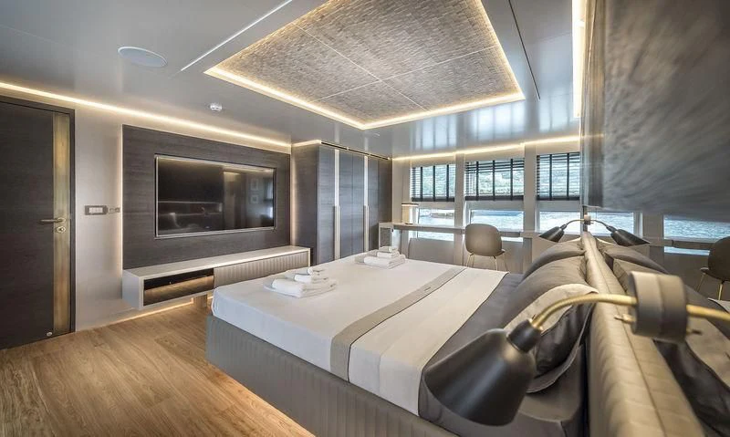 a room with a bed and a tv aboard MARLA Yacht for Sale