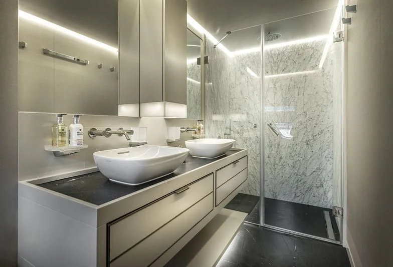 a bathroom with a sink and a shower aboard MARLA Yacht for Sale