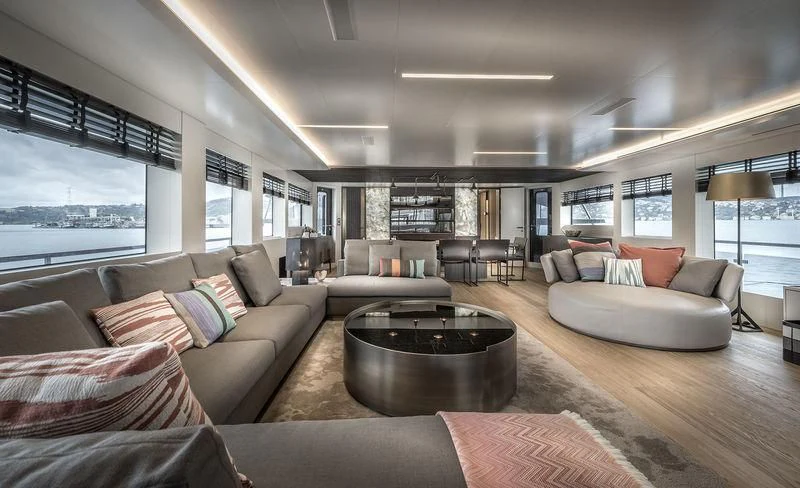 a living room with a large window aboard MARLA Yacht for Sale