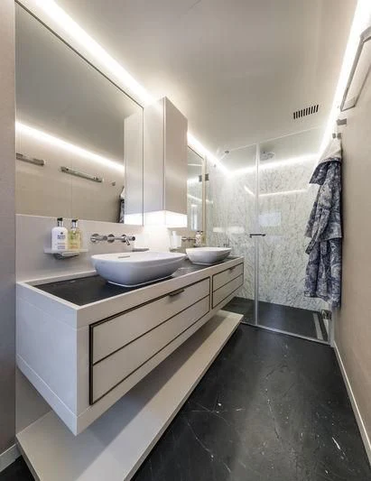 a bathroom with a sink and a mirror aboard MARLA Yacht for Sale