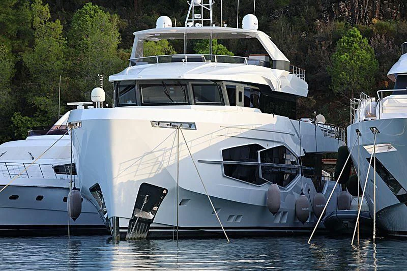 a white boat on the water aboard MARLA Yacht for Sale