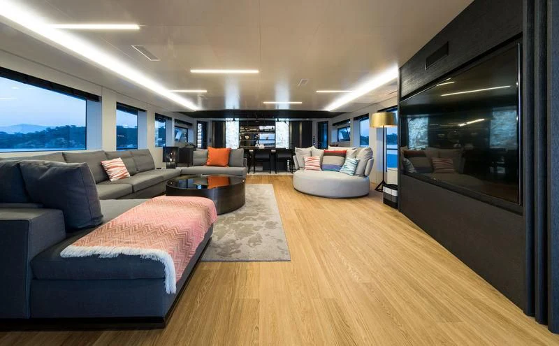 a room with a bed and a couch aboard MARLA Yacht for Sale