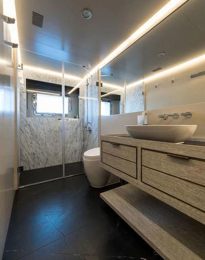 a bathroom with a sink and a toilet aboard MARLA Yacht for Sale