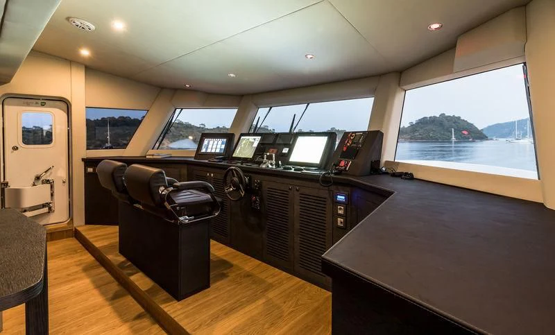 a room with a desk and computer aboard MARLA Yacht for Sale