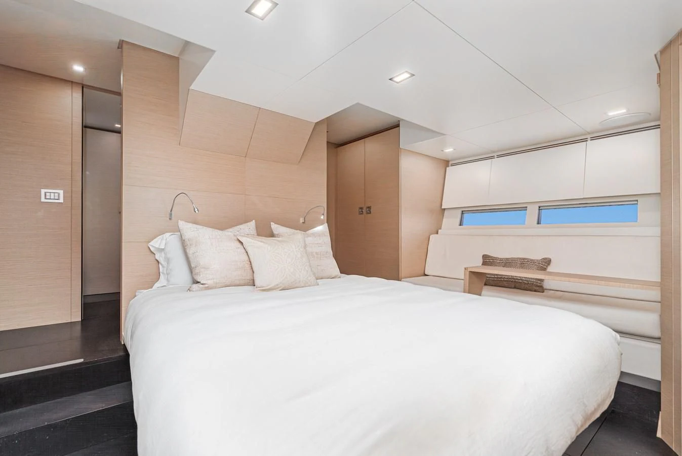 a room with a bed and a desk aboard AIFOS Yacht for Sale