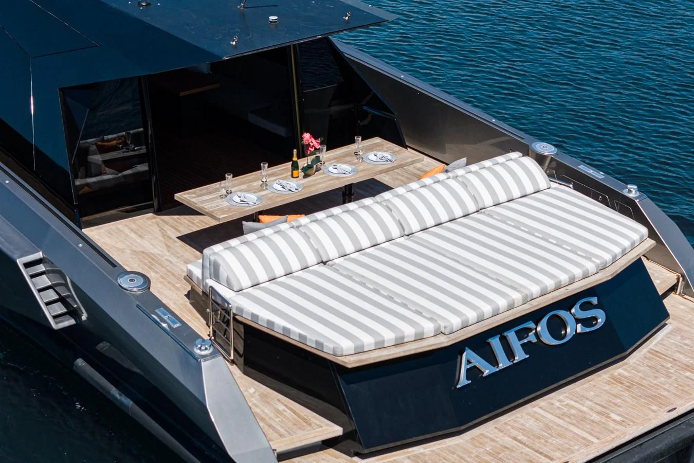 a bed with a cover aboard AIFOS Yacht for Sale