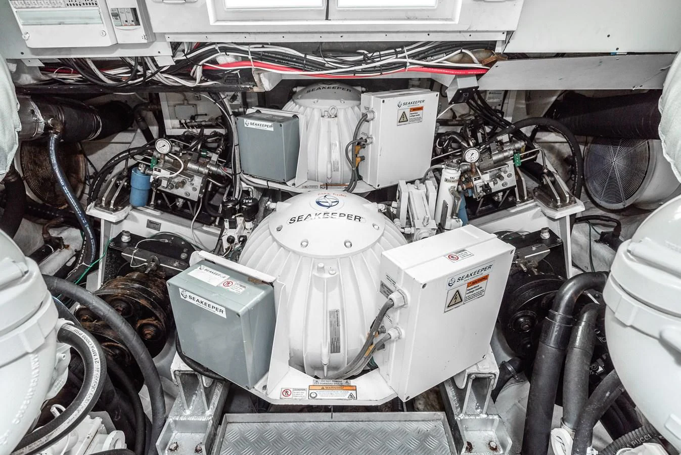 a car engine with a white cylinder aboard AIFOS Yacht for Sale