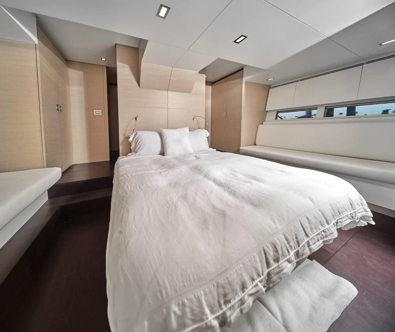 a room with a bed and a window aboard AIFOS Yacht for Sale