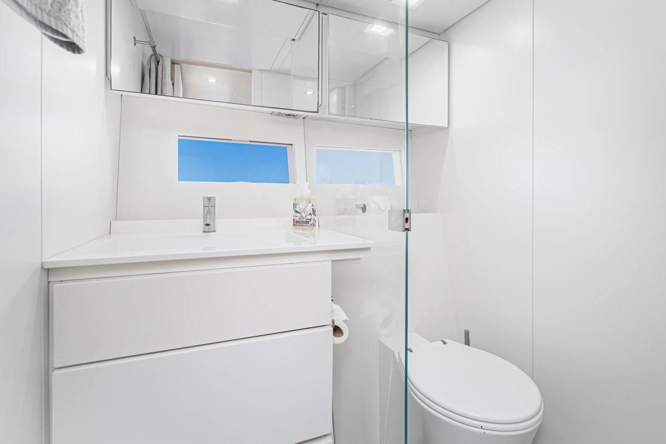 a bathroom with a sink and a toilet aboard AIFOS Yacht for Sale