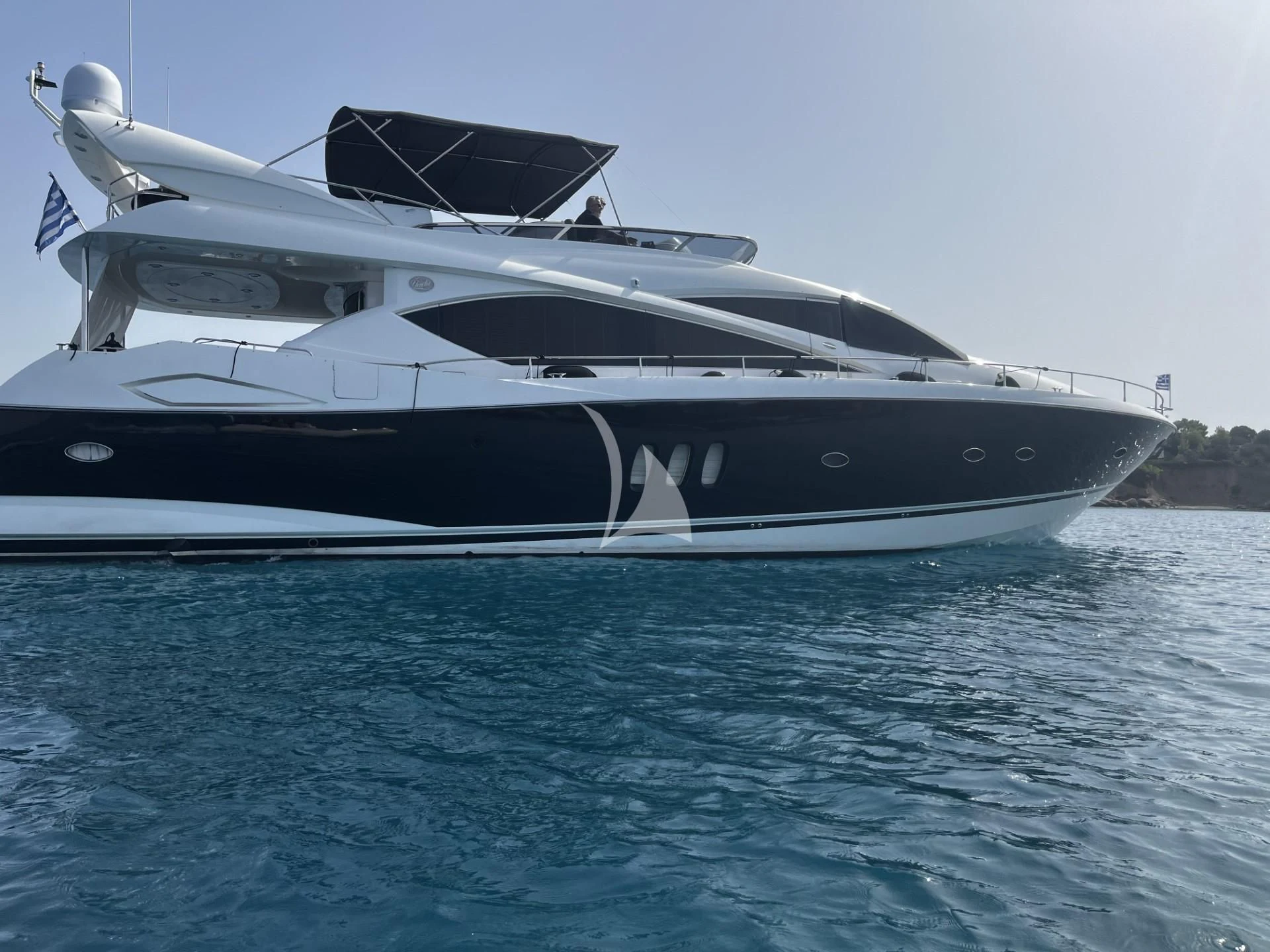 a boat on the water aboard M FIVE Yacht for Charter