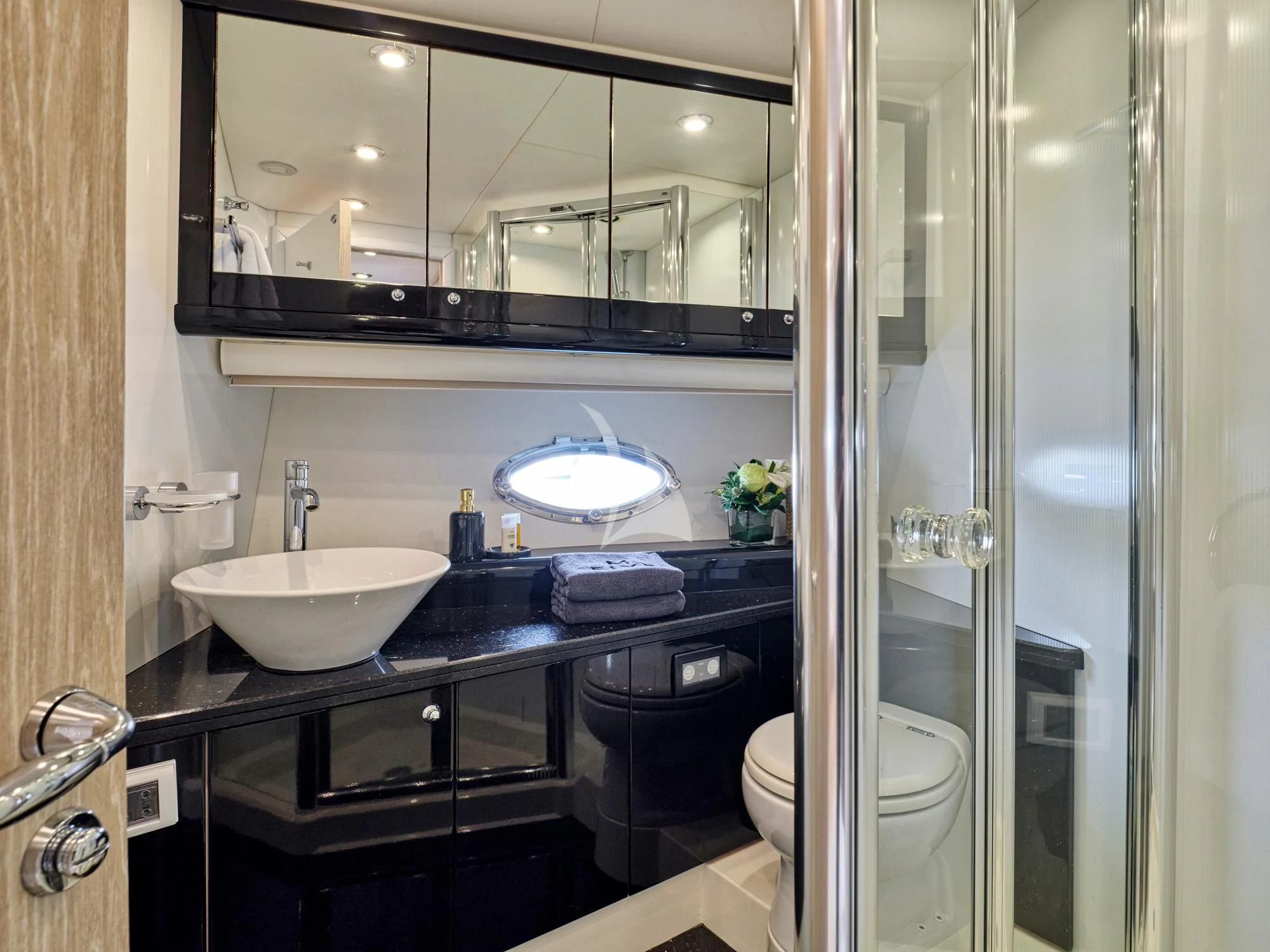 a bathroom with a sink and a toilet aboard M FIVE Yacht for Charter