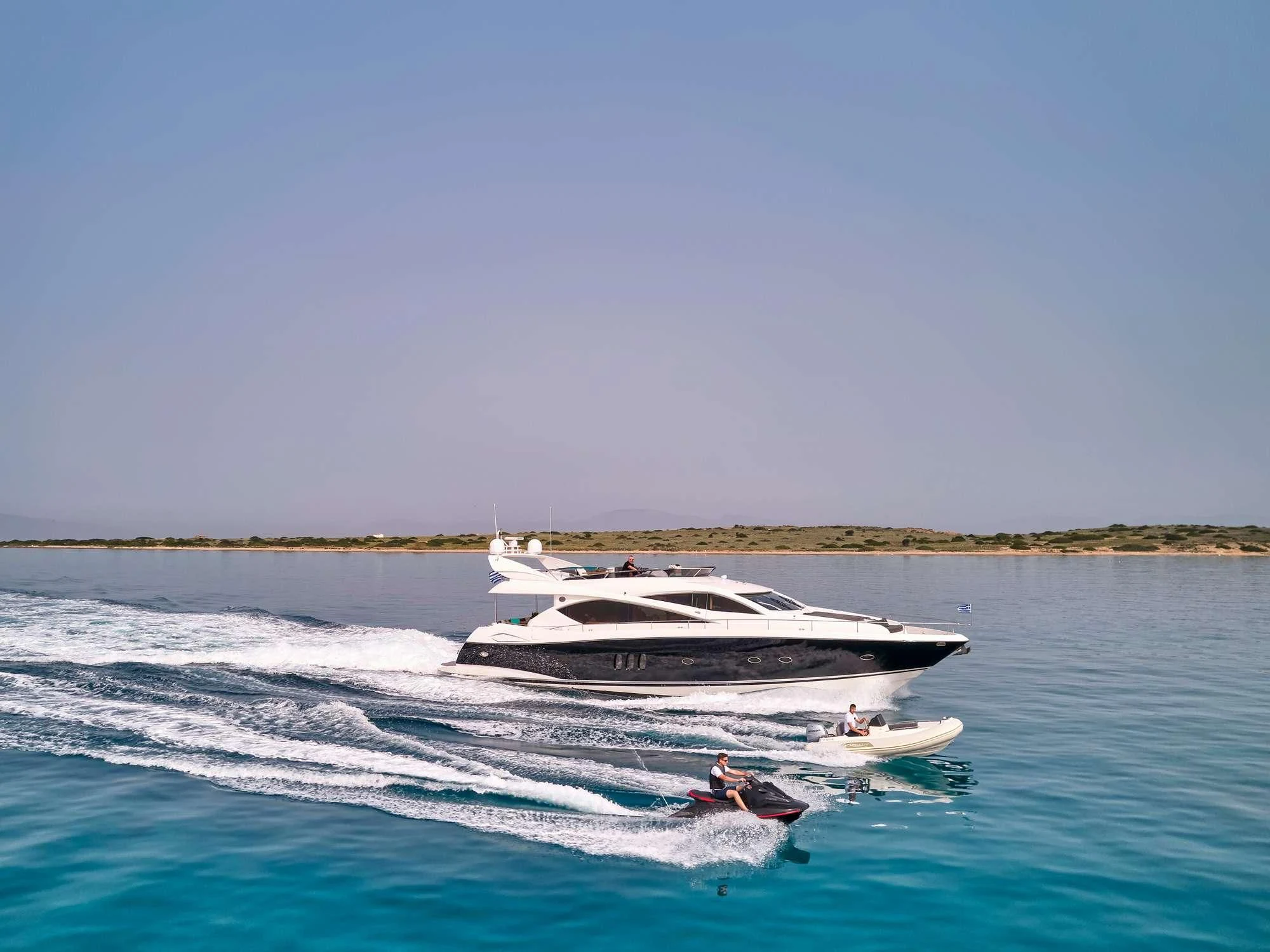 a boat on the water aboard M FIVE Yacht for Charter