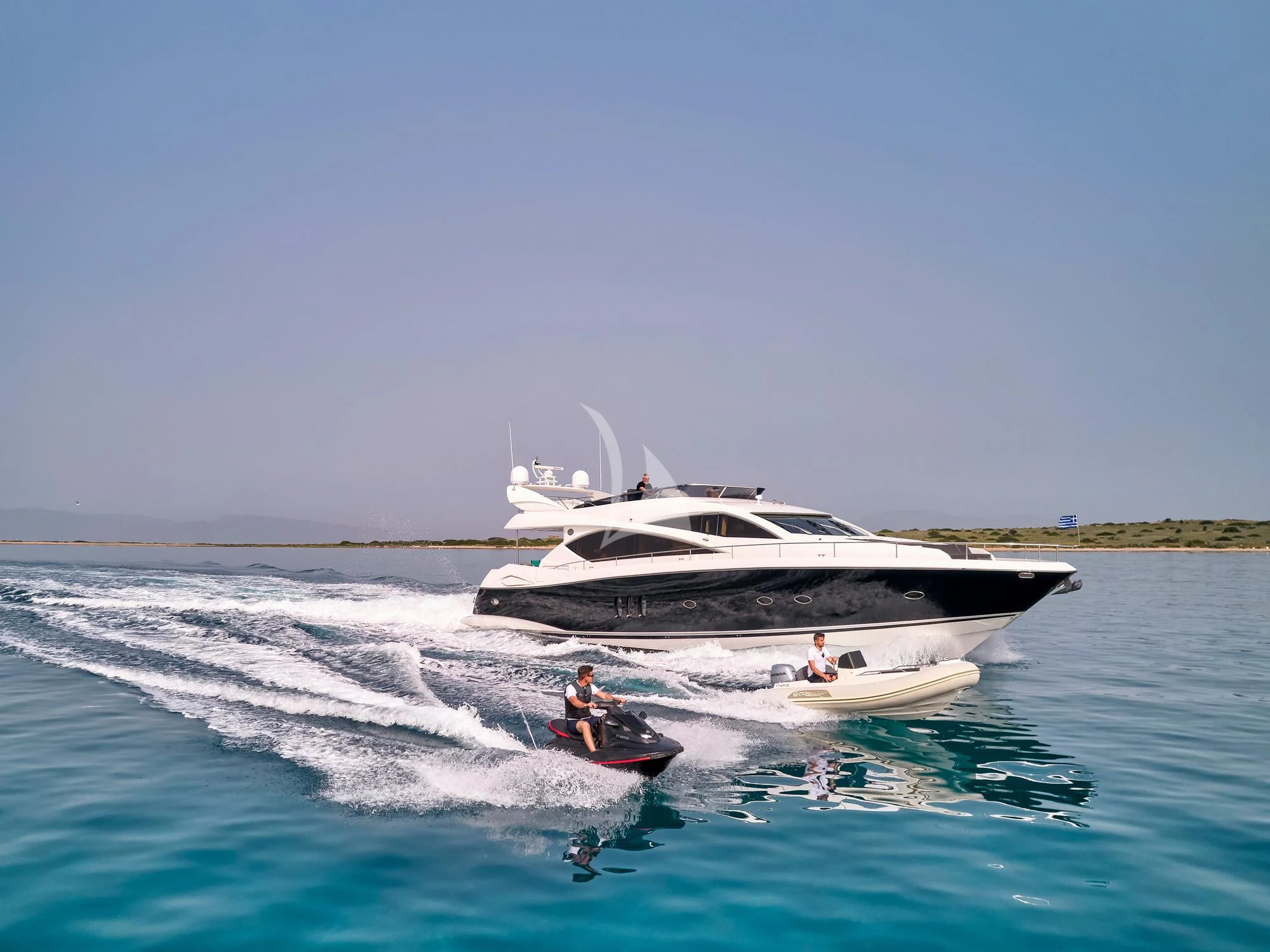 a boat and a boat in the water aboard M FIVE Yacht for Charter