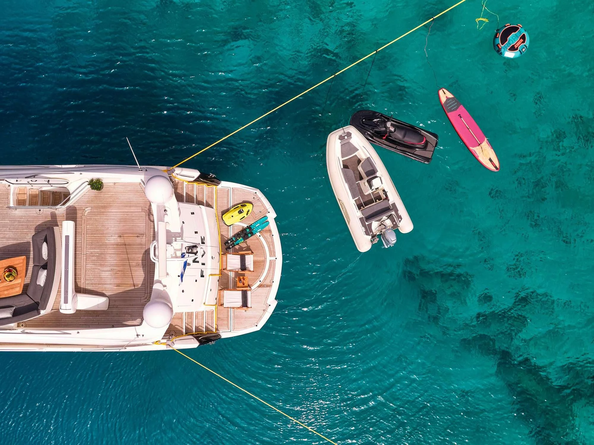 a boat with a rope attached to it aboard M FIVE Yacht for Charter