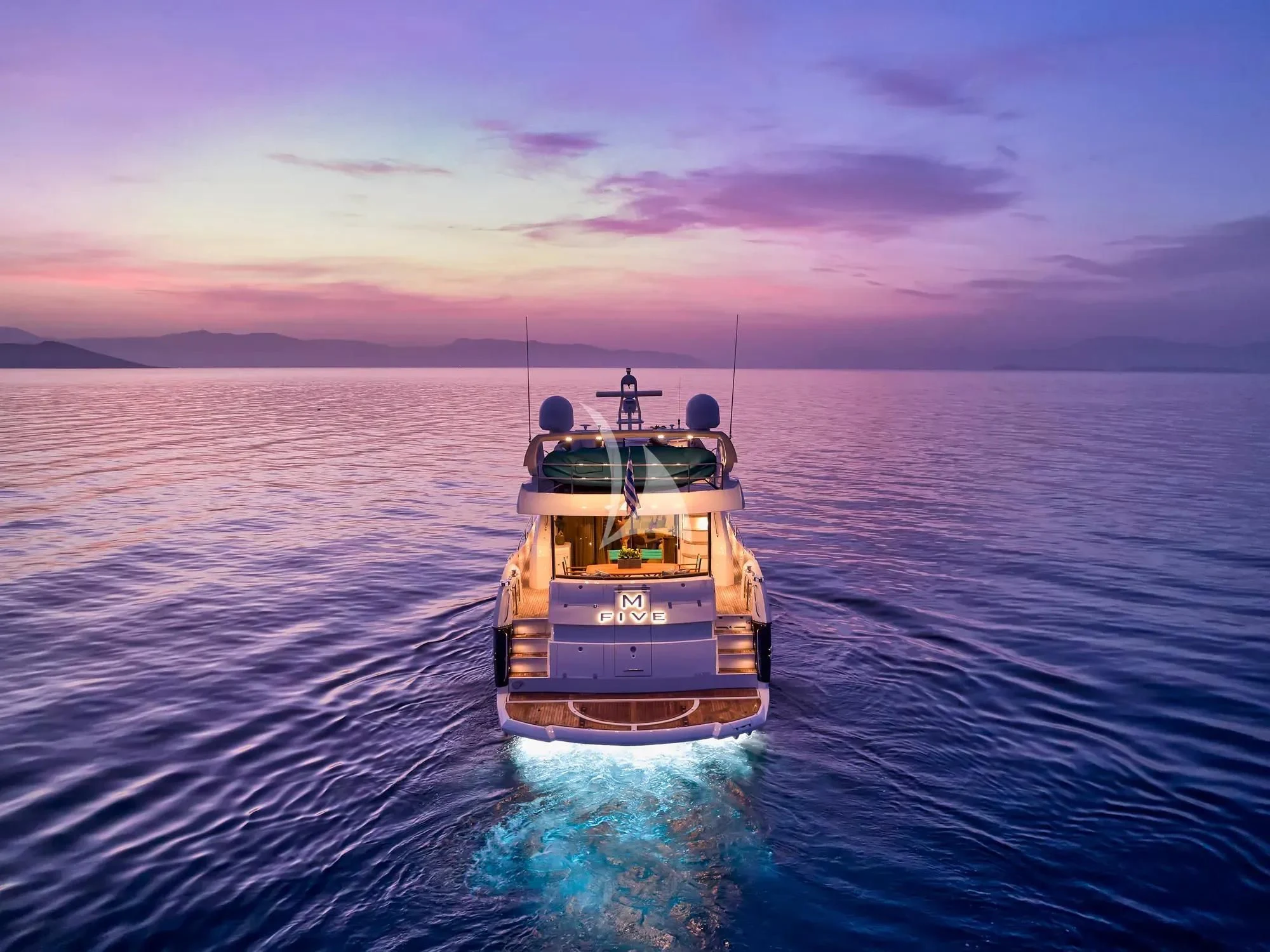 a boat in the water aboard M FIVE Yacht for Charter