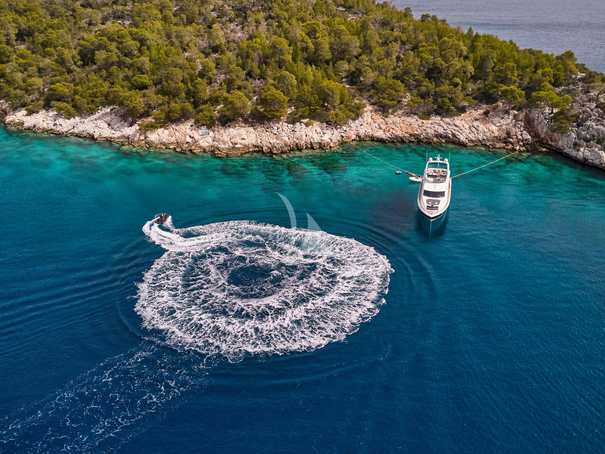 a boat sailing on the water aboard M FIVE Yacht for Charter