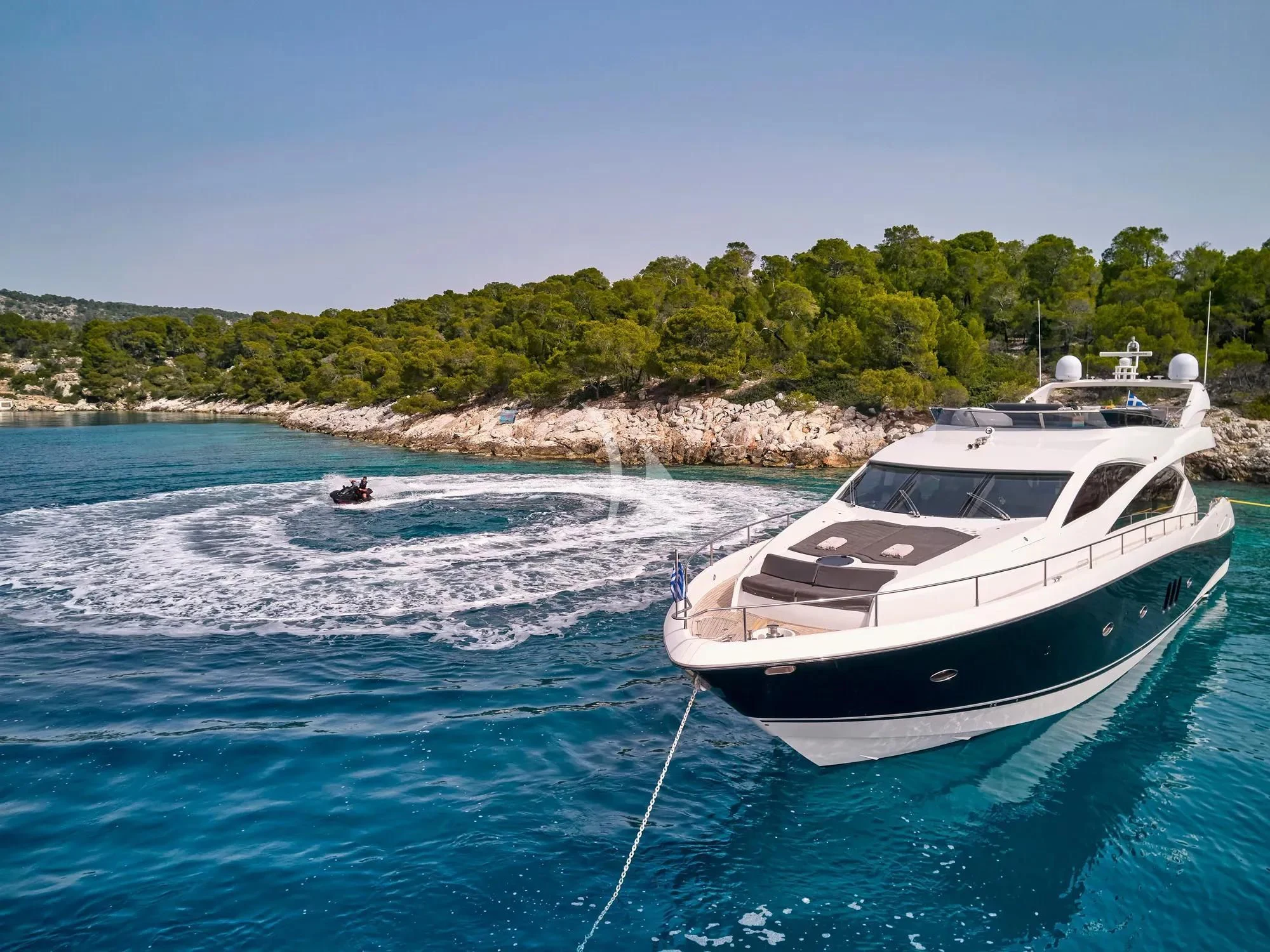 a boat on the water aboard M FIVE Yacht for Charter