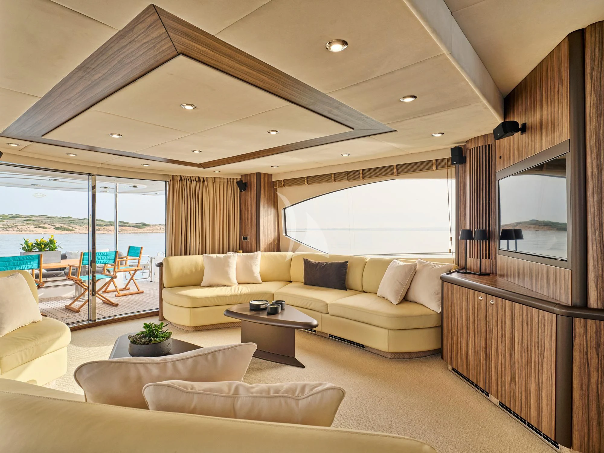 a living room with a large window aboard M FIVE Yacht for Charter