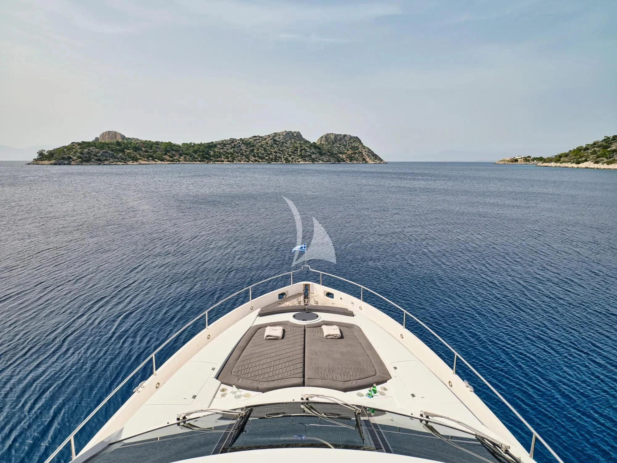 a boat on the water aboard M FIVE Yacht for Charter