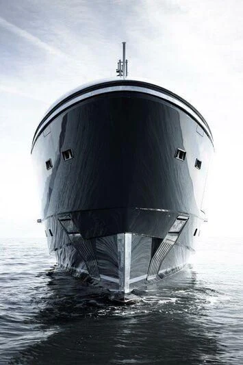 a large ship in the water aboard MY ALMA Yacht for Sale